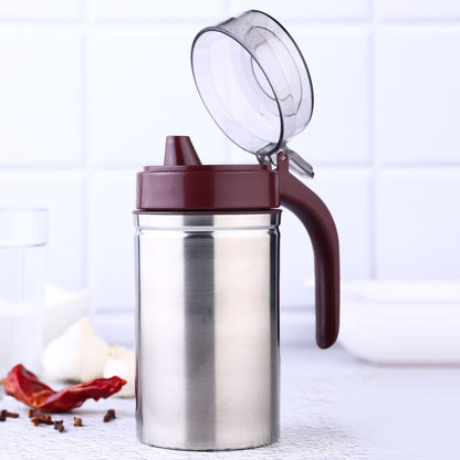 Wukusy stainless steel oil dispenser with small nozzle, 500ml capacity, ideal for kitchen oil storage and pouring.