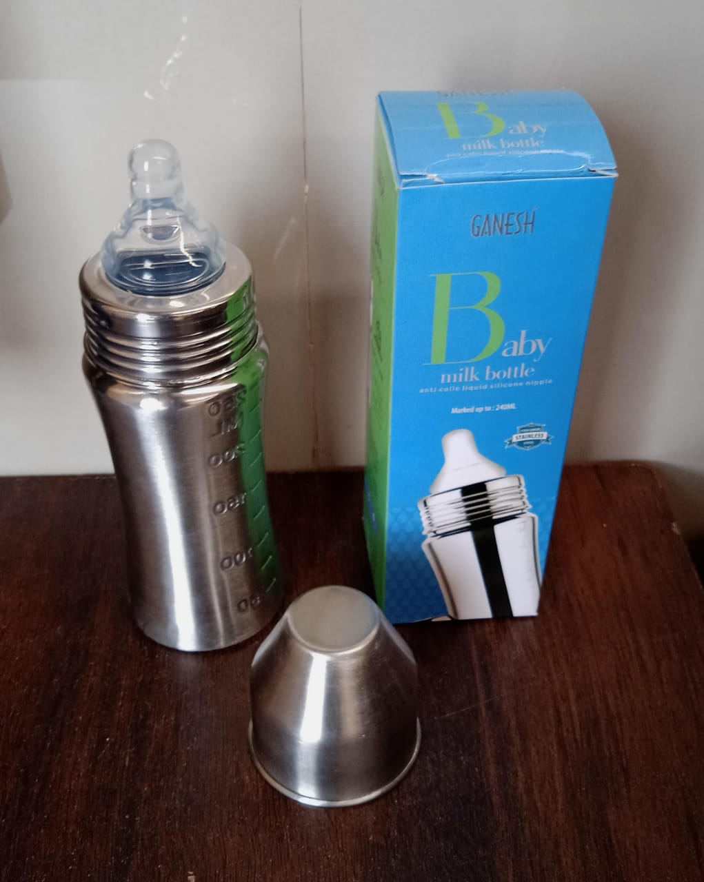Stainless steel Ganesh baby feeding bottle by Wukusy, 250ml for newborns and toddlers, BFA free, suitable for infants up to 3 years.
