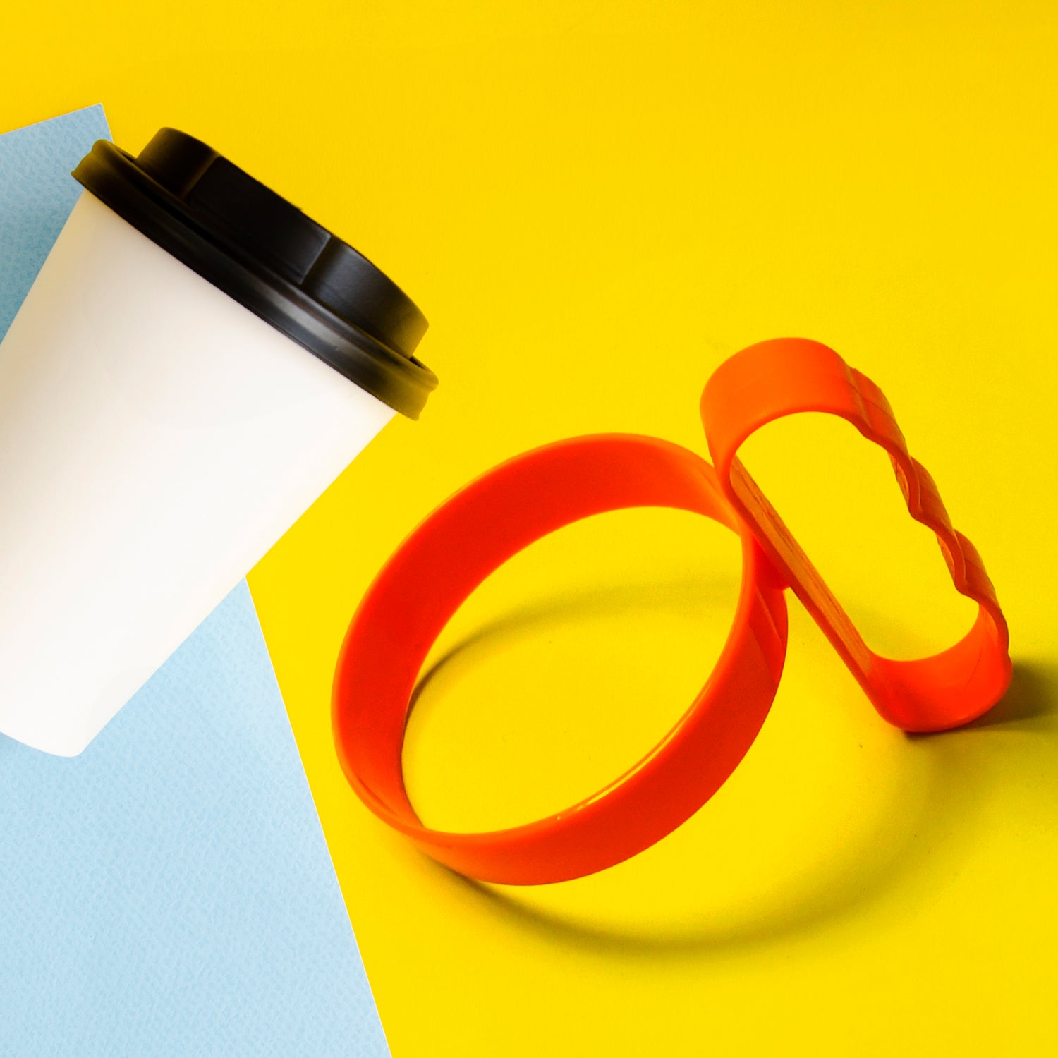Wukusy plastic tumbler handle with anti-slip grip, lightweight travel mug holder, designed for cups and tumblers.
