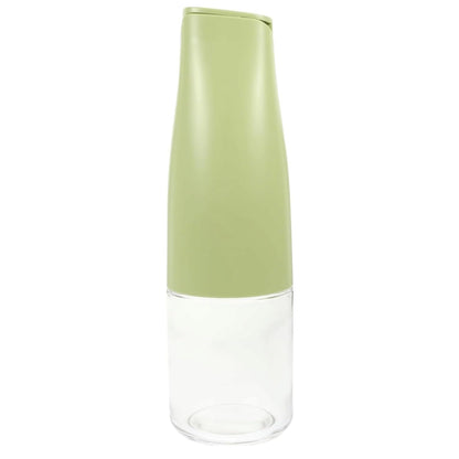Wukusy 500ml glass oil dispenser with automatic open lid, ideal for cooking, grilling, and frying in the kitchen.