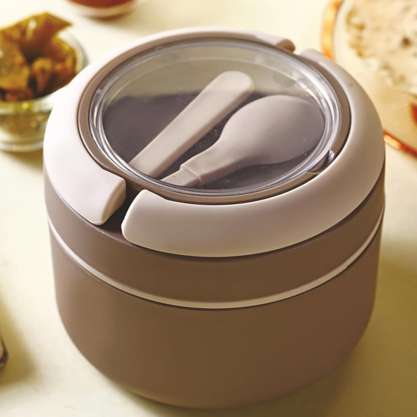 Wukusy Ganesh Cresta insulated food lunch box with leak-proof design and spoon, perfect for office, school, or picnic use.