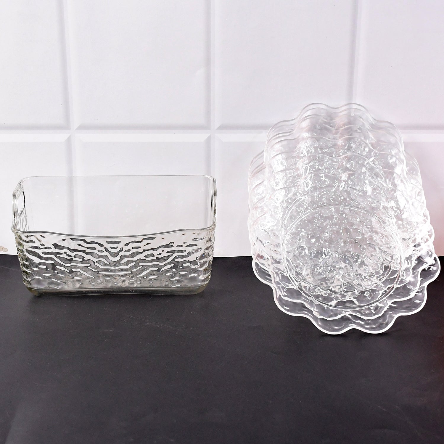 Wukusy 9-in-1 plastic bowl set with serving tray and plates, perfect for home kitchen use. Clear view of bowls and tray layout.