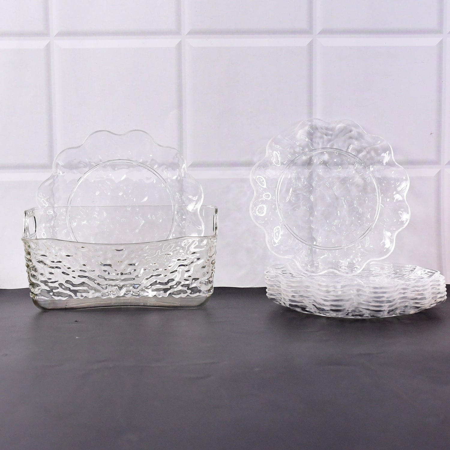 Wukusy 9-in-1 plastic bowl set with serving tray and plates for home and kitchen use, displayed on a table.