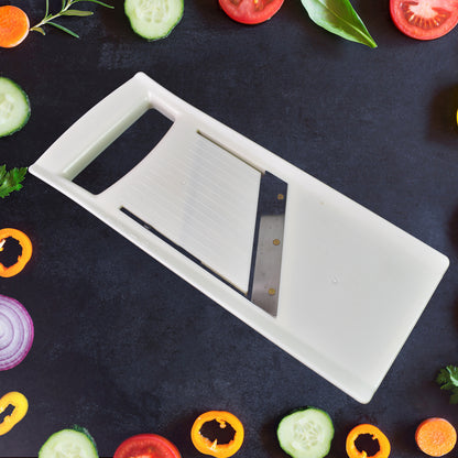 Wukusy adjustable fruit and vegetable slicer for home kitchen use, showing the versatile cutting blade and handle.