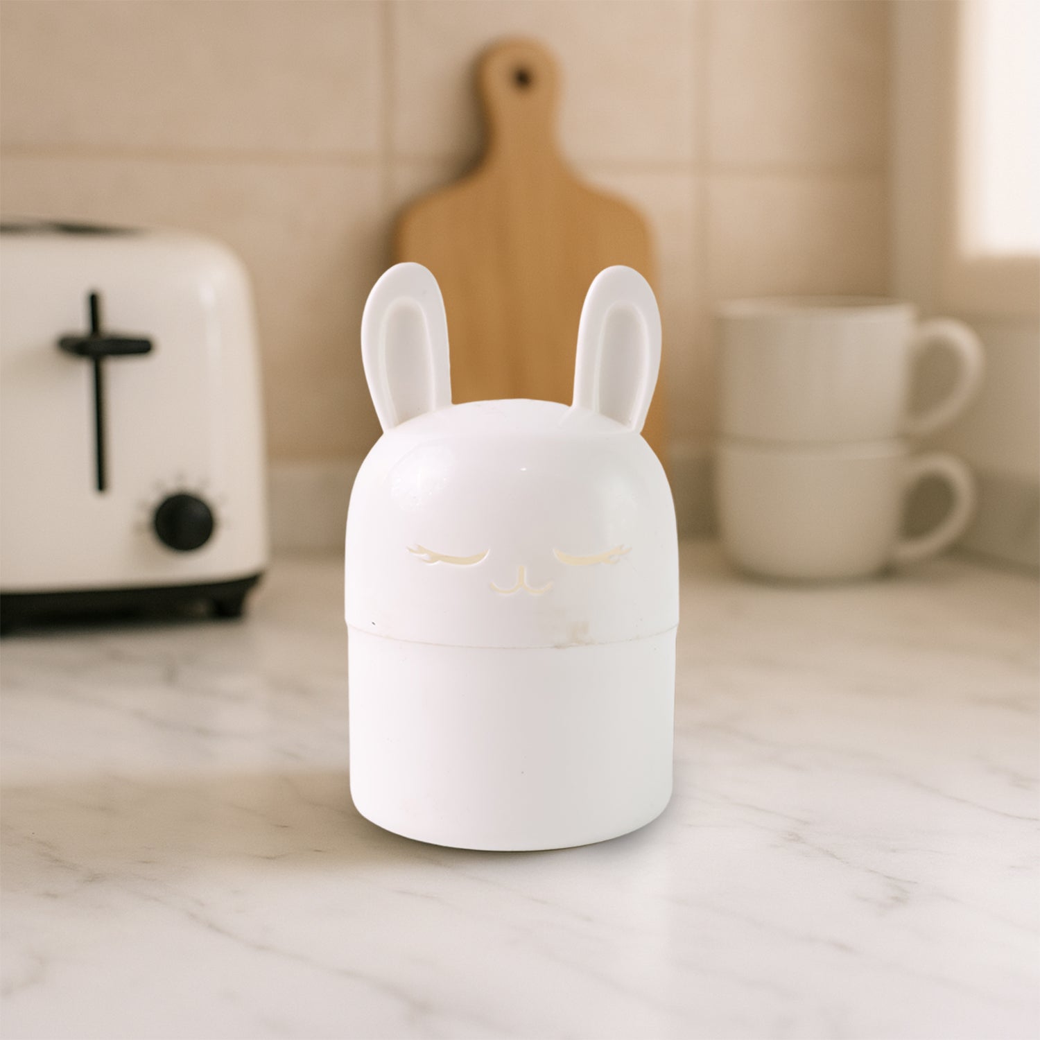 Wukusy adorable bunny-shaped kitchen storage box for organizing utensils or small items in home and kitchen spaces.