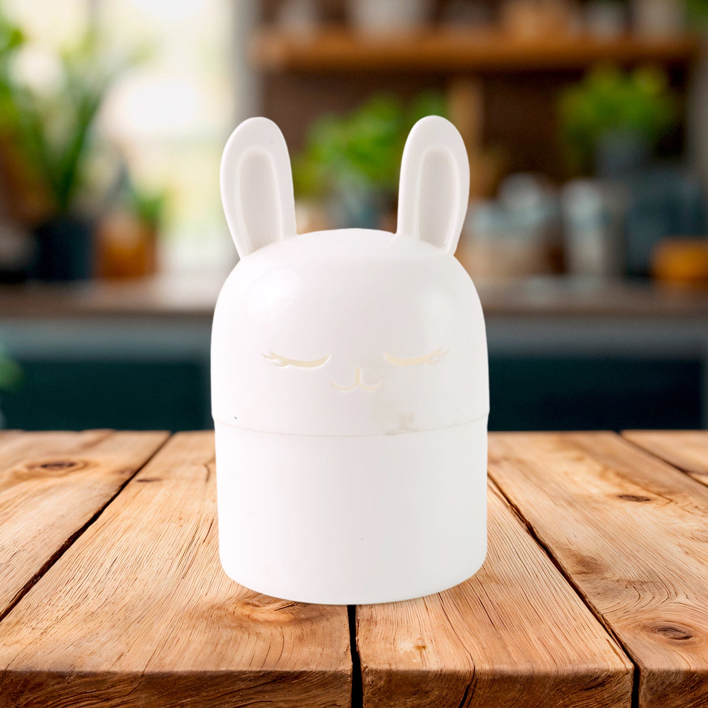 Wukusy adorable bunny-shaped kitchen storage box for organizing utensils, snacks, or small items in home and kitchen spaces.