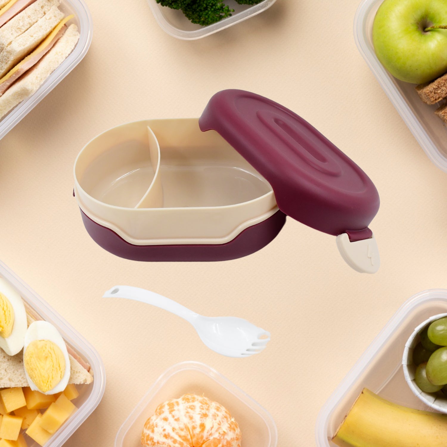 Wukusy airtight food-grade tiffin box with two compartments and a 2-in-1 spoon, suitable for home and kitchen use.