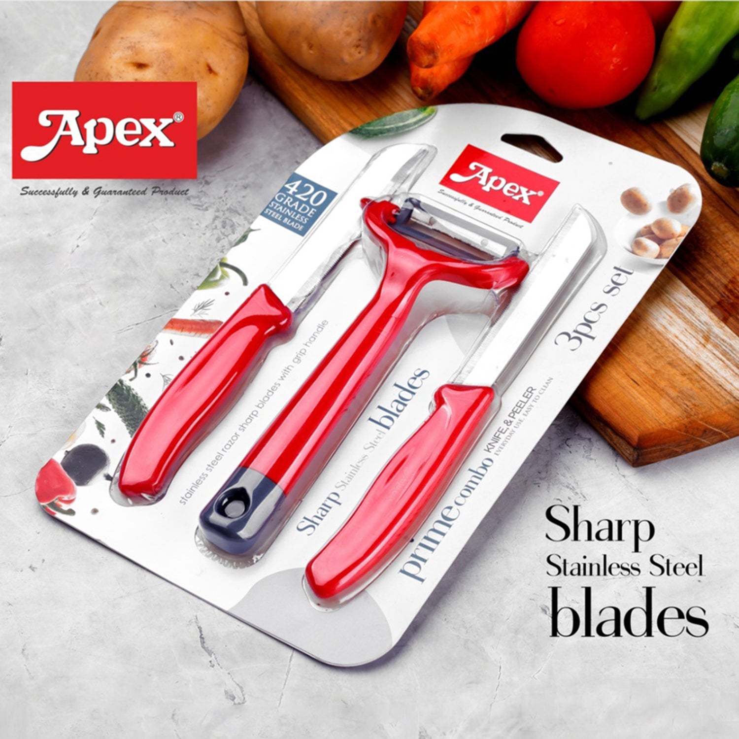 Wukusy Apex 3-piece stainless steel kitchen knife and peeler set with chef's knife, paring knife, and vegetable peeler on a countertop.