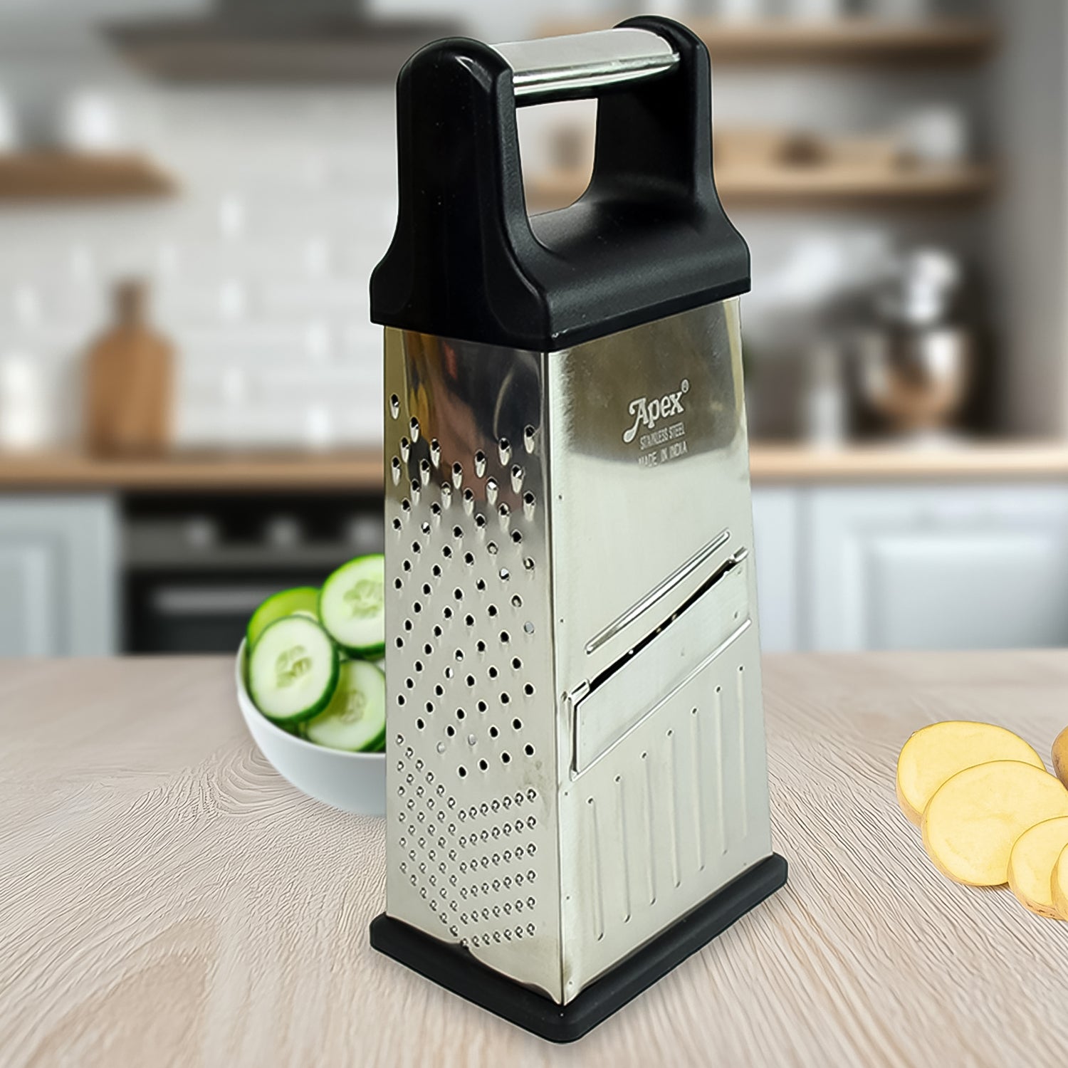 Wukusy Apex 5-in-1 Master stainless steel multipurpose slicer and grater for home kitchen use, with multiple blades for versatile food prep.