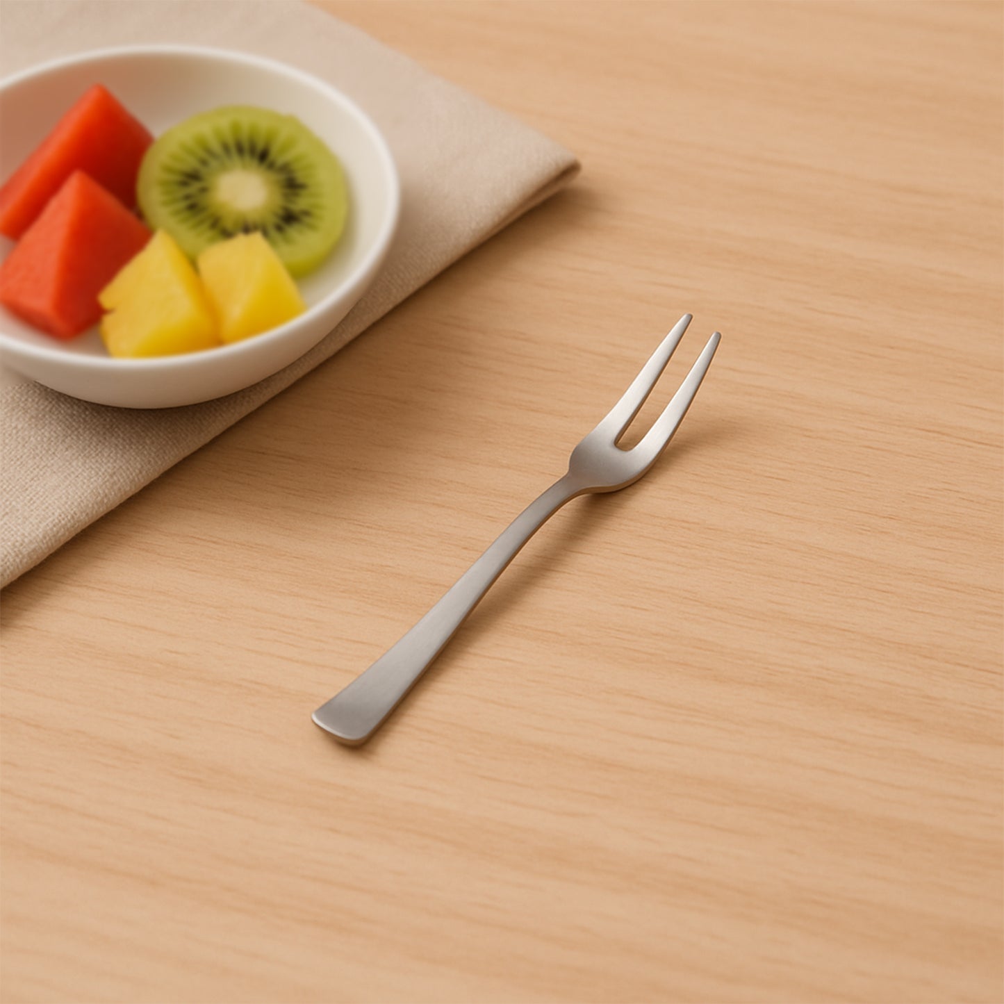 Set of six stainless steel fruit forks by Wukusy, perfect for serving and eating fruits in a home kitchen setting.