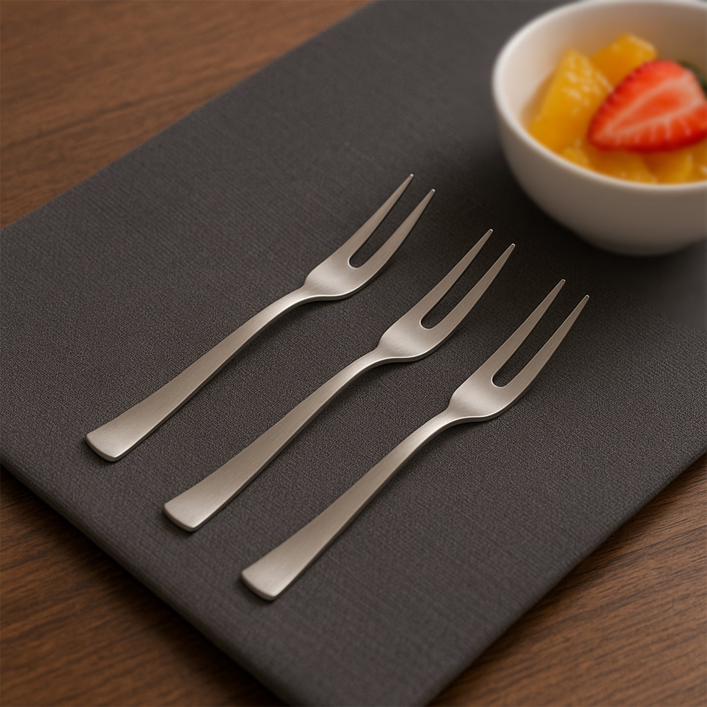 Wukusy Apex 6-in-1 stainless steel fruit fork set with six different fork types for versatile fruit serving in home and kitchen.