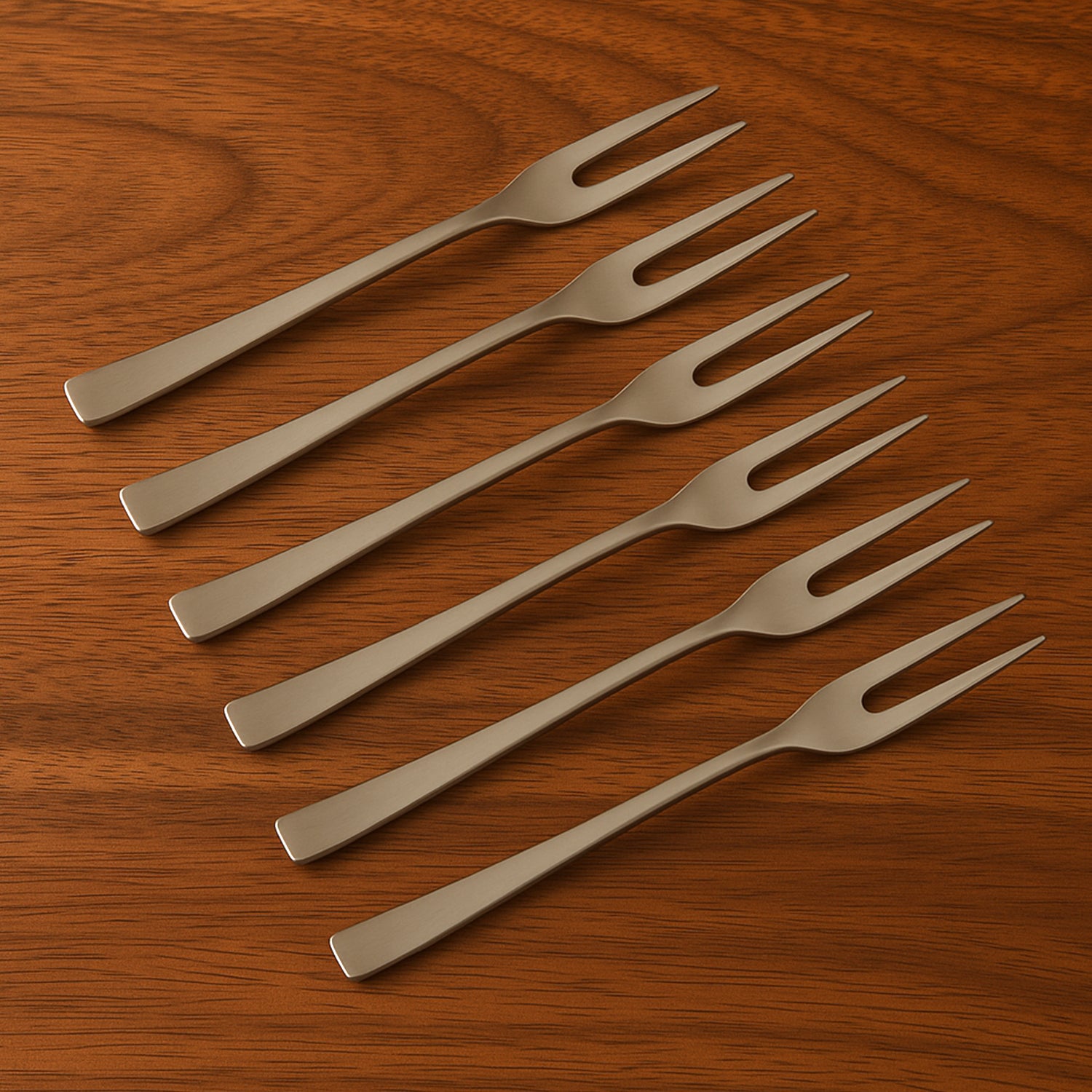 Wukusy Apex 6-in-1 stainless steel fruit fork set with six different fork tips for versatile fruit serving in a home and kitchen setting.