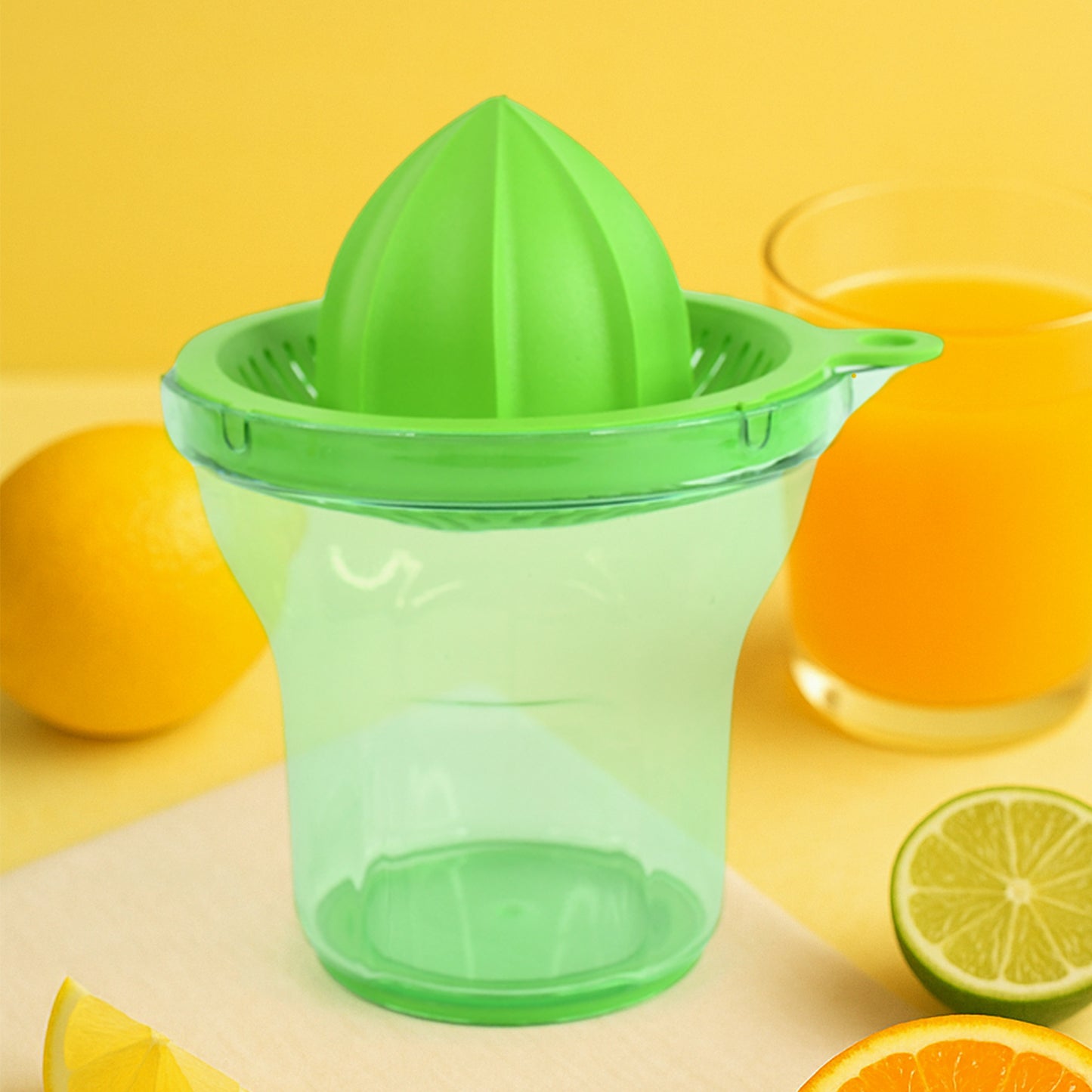 Wukusy Apex Manual Citrus Juicer in use, showing hand pressing fresh oranges for juice in a kitchen setting