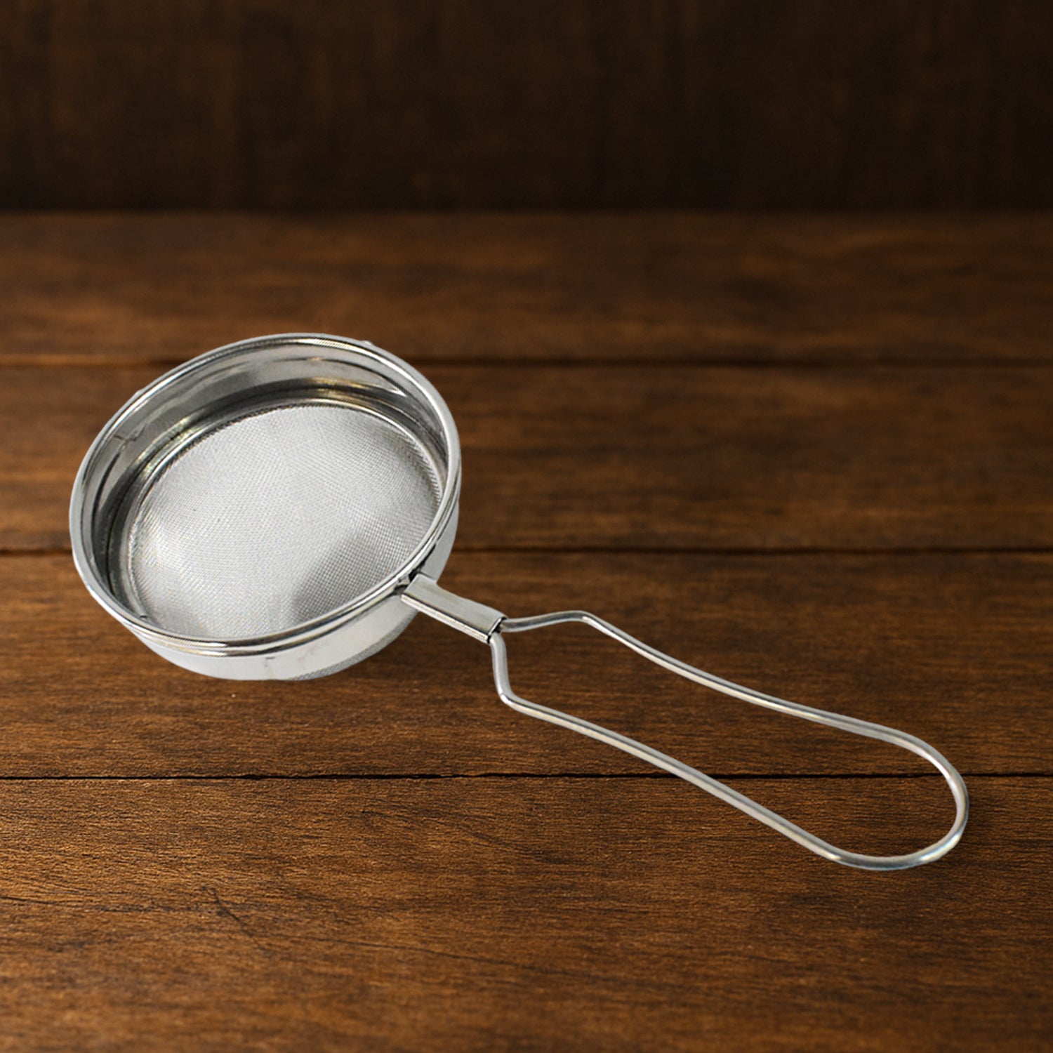 Wukusy Apex Morning stainless steel tea and coffee strainer with fine mesh for smooth brewing in a home kitchen setting