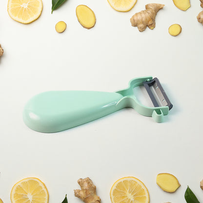 Wukusy Apex multipurpose ginger peeler with stainless steel dual blades, designed for efficient peeling in home and kitchen use.