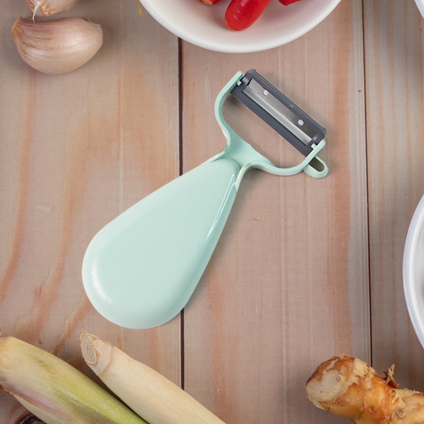 Wukusy Apex multipurpose ginger peeler with stainless steel dual blade for easy peeling in home and kitchen tasks.