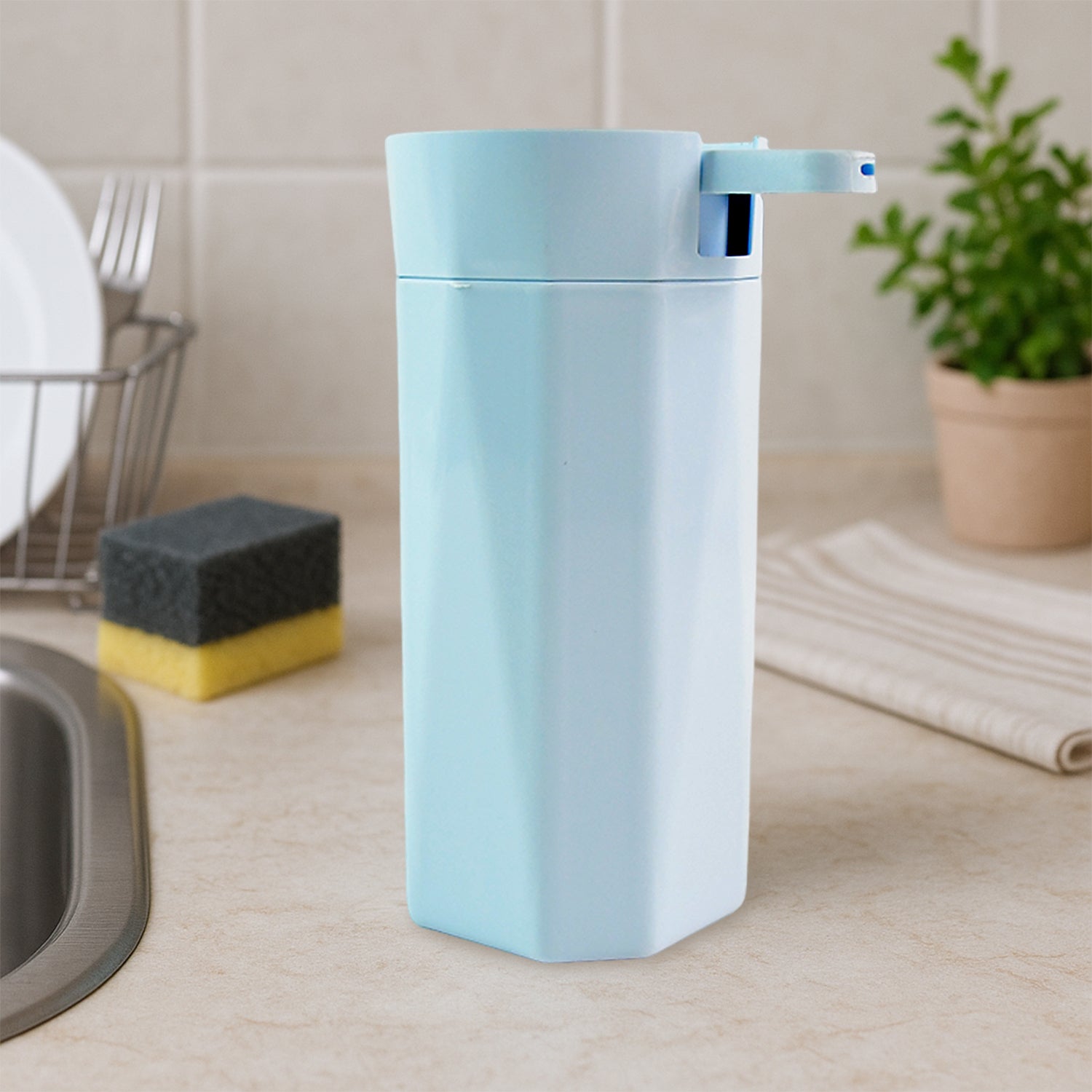 Wukusy Apex Push It soap dispenser, 300ml, in a modern kitchen setting, with a sleek design and push button for easy soap dispensing.