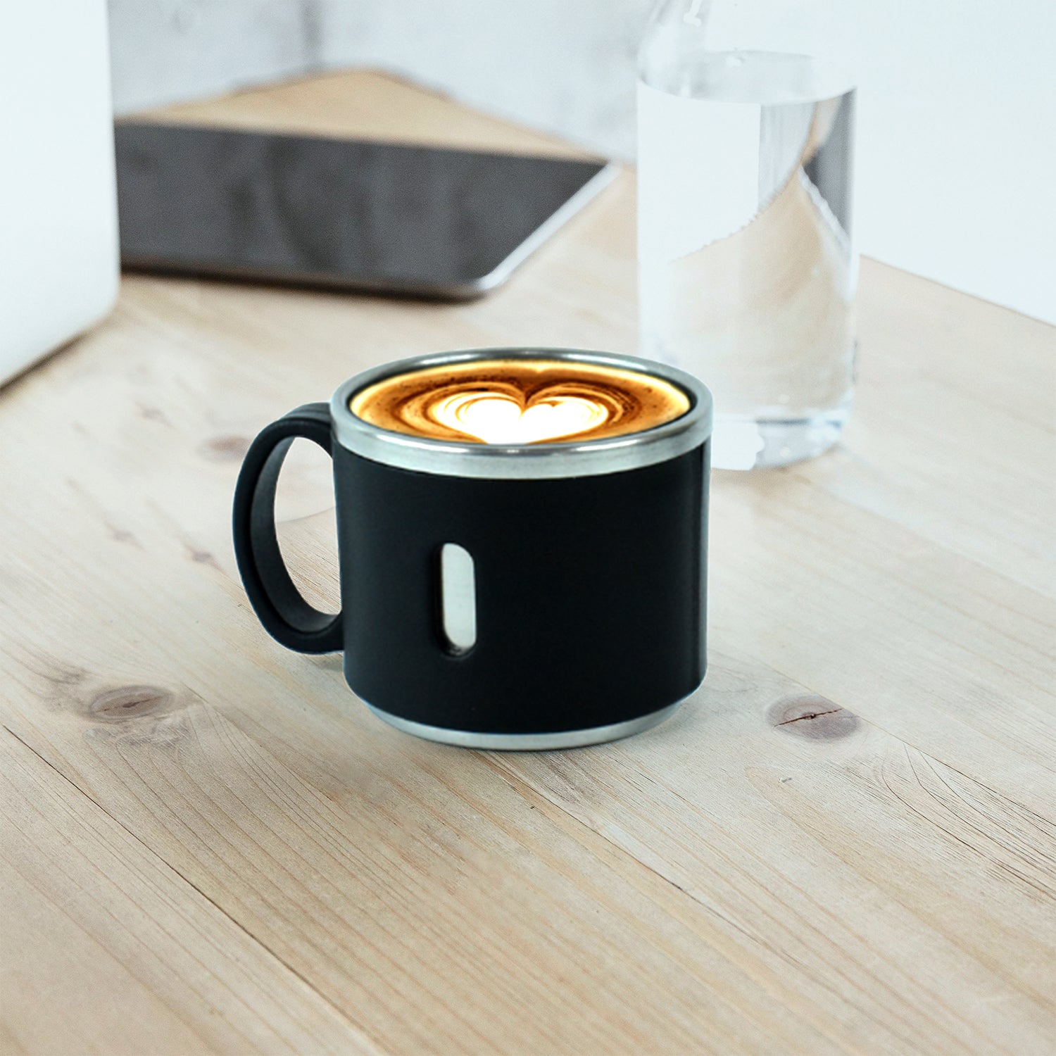 Six Wukusy Apex stainless steel desk mugs arranged on a kitchen countertop, showcasing durable, modern coffee mugs for home use.