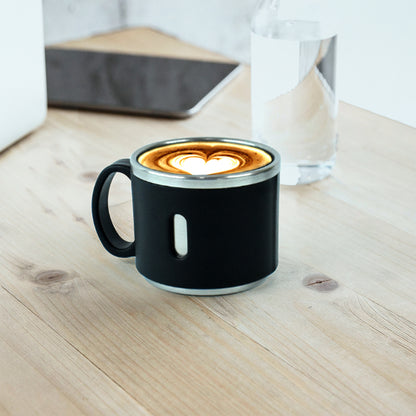 Six Wukusy Apex stainless steel desk mugs arranged on a kitchen countertop, showcasing durable, modern coffee mugs for home use.