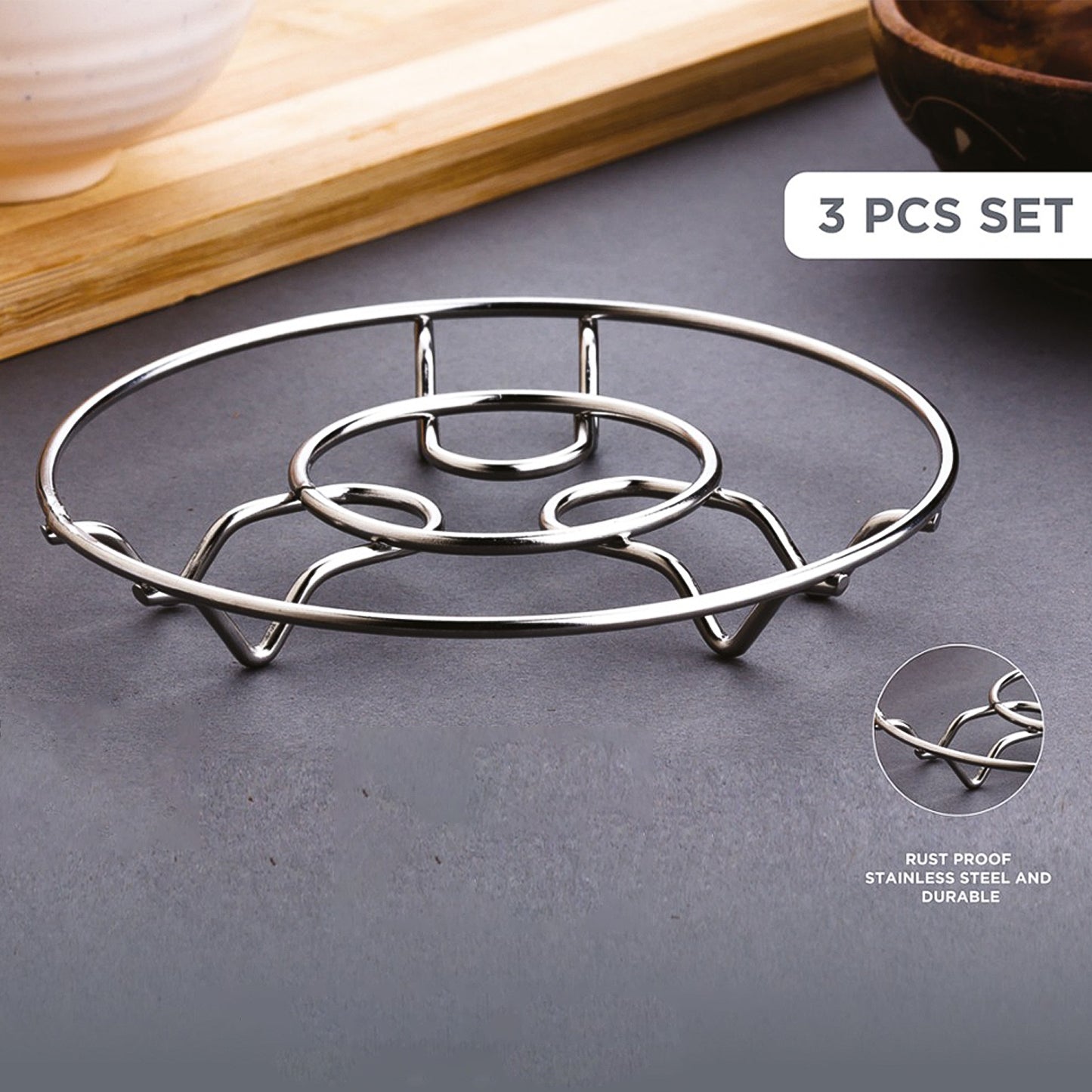 Set of three Wukusy Apex stainless steel wire trivets for hot pots and pans, ideal for home kitchen use.
