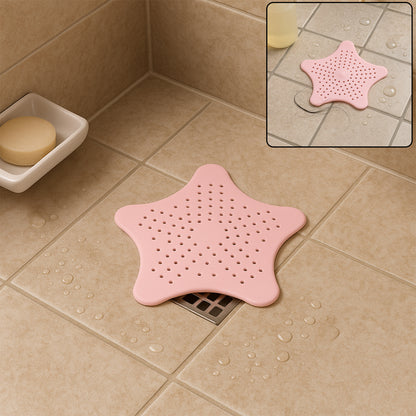 Baby pink silicone star-shaped sink filter by Wukusy, bathroom hair catcher and drain strainer for basin, kitchen, and bathroom use.
