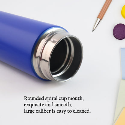 Blue Wukusy vacuum insulated water bottle, 500ml, designed for keeping drinks hot or cold, ideal for home and kitchen use.