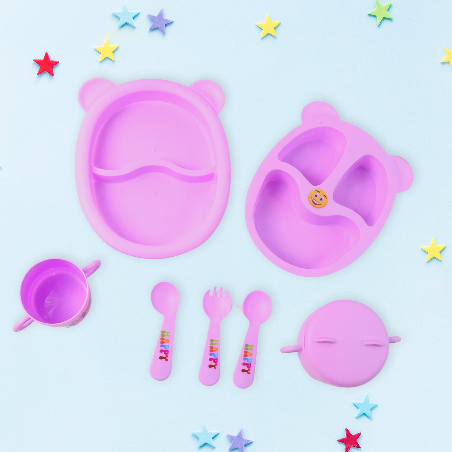 Wukusy children's tableware dining set with colorful plates, bowls, and cups for kids' meal time in a home kitchen setting.