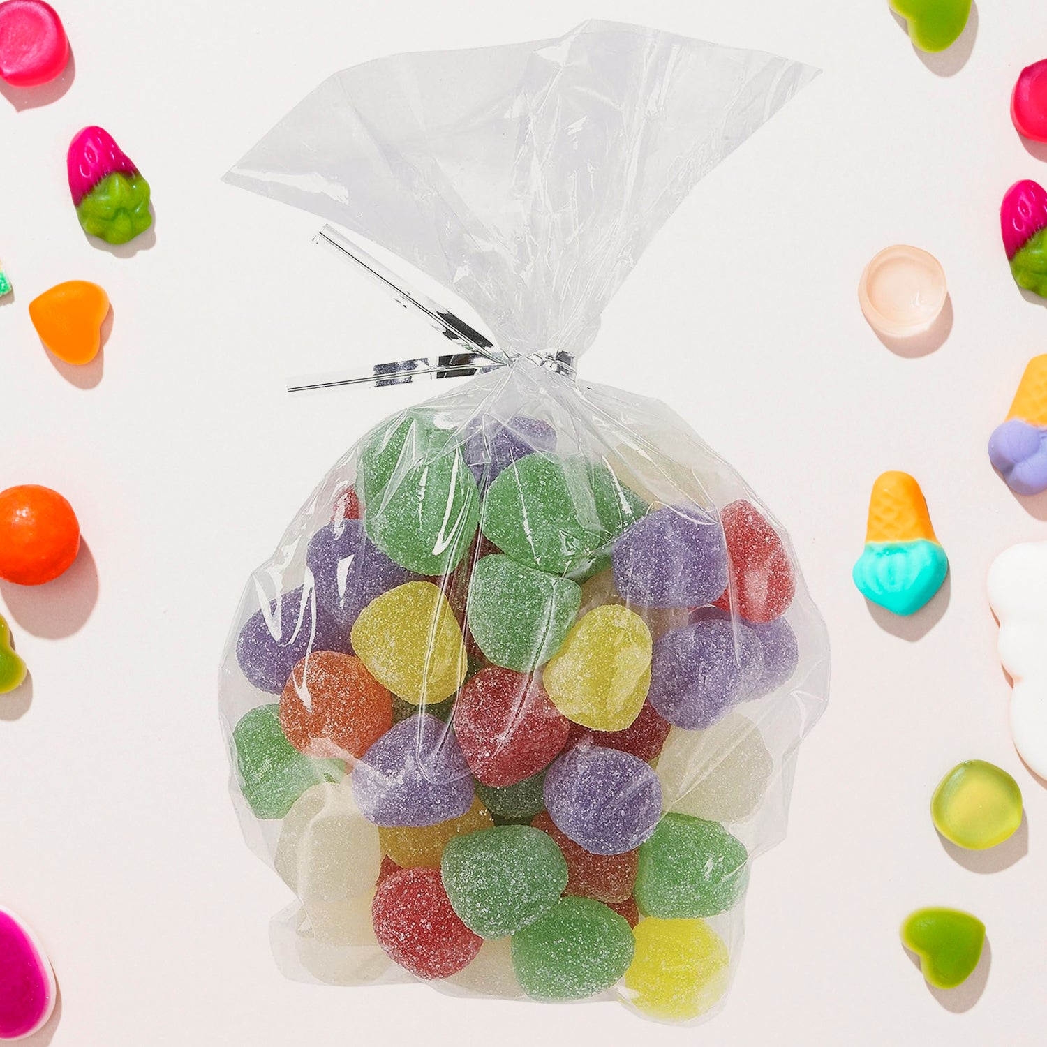 Set of 50 clear cookie bags by Wukusy, flat treat gift bags for packaging baked goods or treats in home and kitchen use.