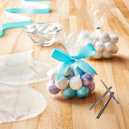 Set of 50 clear cookie bags from Wukusy, flat treat gift bags perfect for packaging baked goods or treats.
