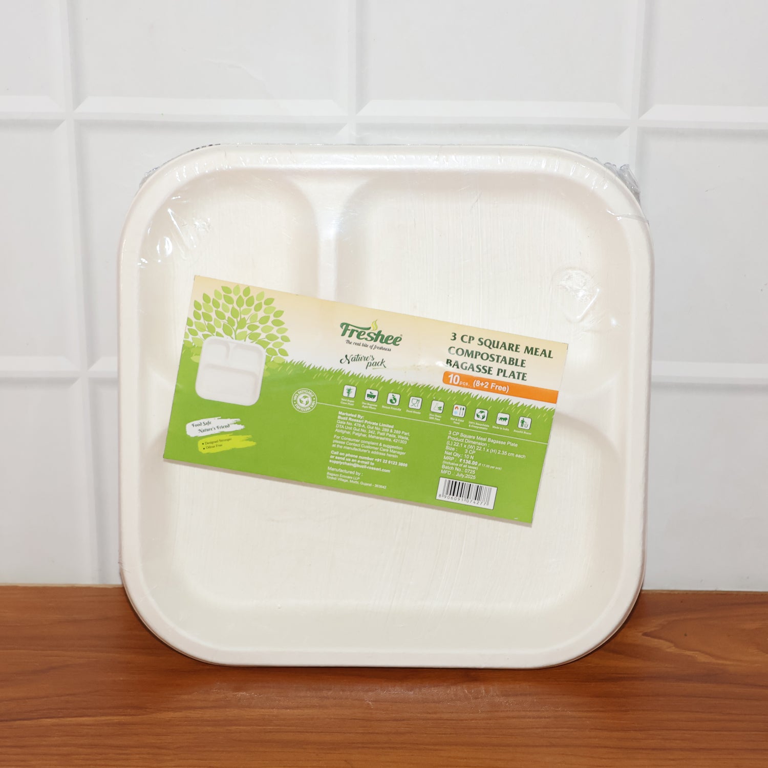 Wukusy compostable bagasse 3-compartment square meal plate for home and kitchen use, showing divided sections for meal presentation.