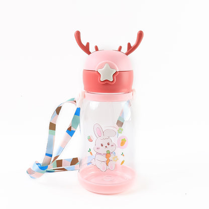 Cute cartoon water bottle by Wukusy, approx 450ml, featuring colorful design, ideal for home and outdoor use.