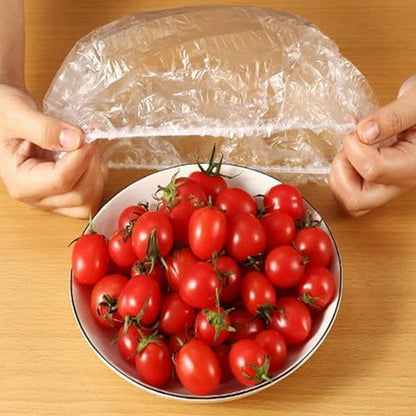 Wukusy disposable elastic food storage covers bag set with 100 large plastic covers for kitchen and food storage.