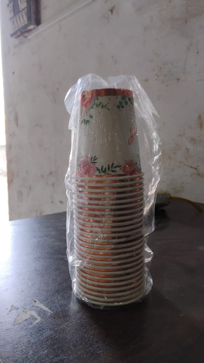 Set of 24 Wukusy disposable paper tea and coffee cups in assorted colors and designs, ideal for home and kitchen use.