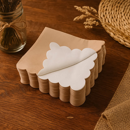 Set of 120 disposable tissue napkins with scalloped edges from Wukusy, ideal for home and kitchen use.