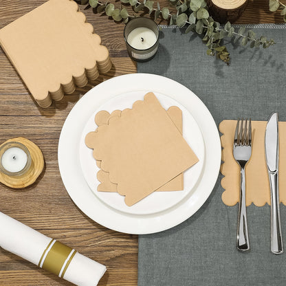 Set of 120 Wukusy disposable tissue napkins with scalloped edges, ideal for home and kitchen use, featuring elegant design.