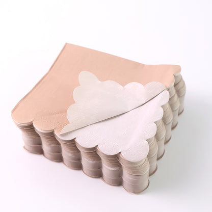 Set of 120 disposable tissue napkins with scalloped edges from Wukusy, ideal for home and kitchen use.