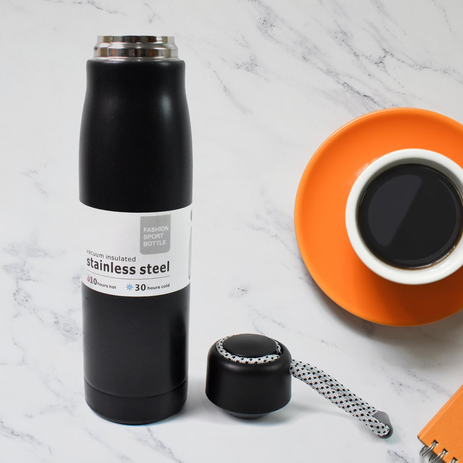 Wukusy double wall vacuum insulated water bottle, 550 ml, stainless steel, with a screw-on lid and sleek design for hot or cold drinks.