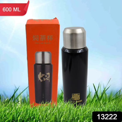 Wukusy double-walled insulated thermal bottle for hot and cold water, tea, or coffee, 600 ml, in a home and kitchen setting.