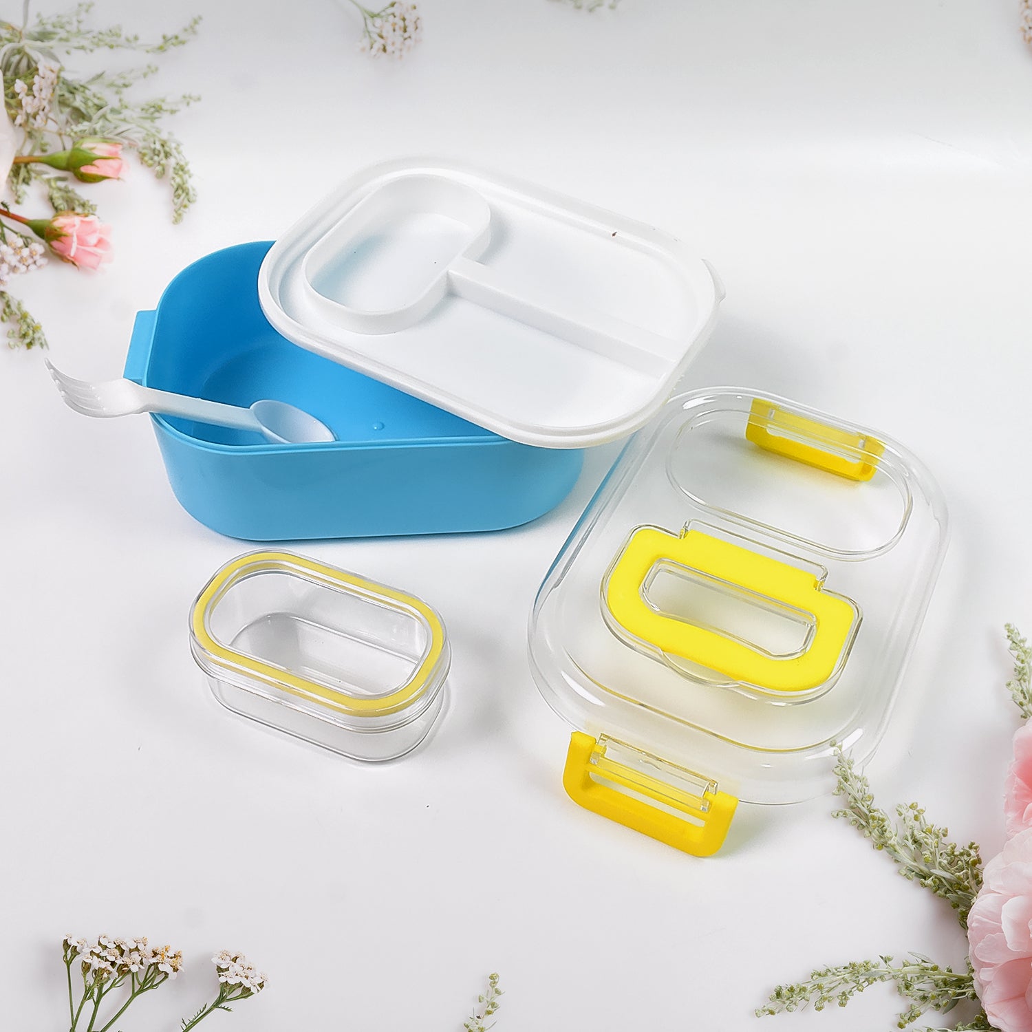 Durable plastic lunch box for kids by Wukusy with built-in 2-in-1 spoon and fork, ideal for school and outings.