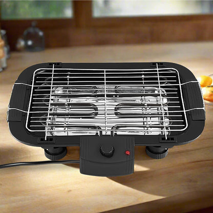 Wukusy electric barbecue grill with 2000W power, compact home kitchen appliance for grilling and outdoor cooking.