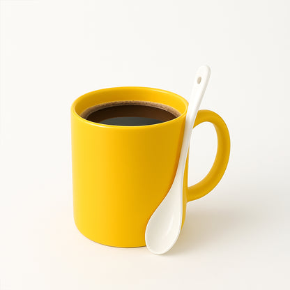 Elegant ceramic mug with matching spoon from Wukusy, perfect for home and kitchen use, showcasing a stylish design.