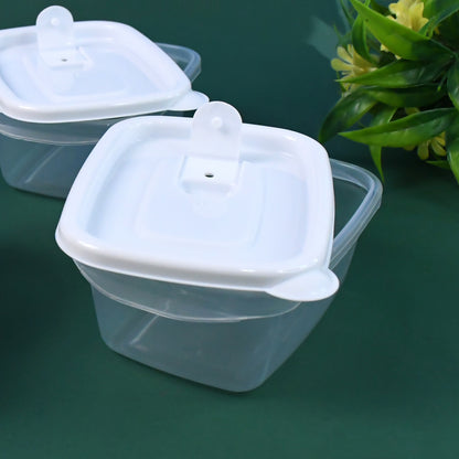 Set of four Wukusy microwave-safe food storage containers in 400ml size for home kitchen use.