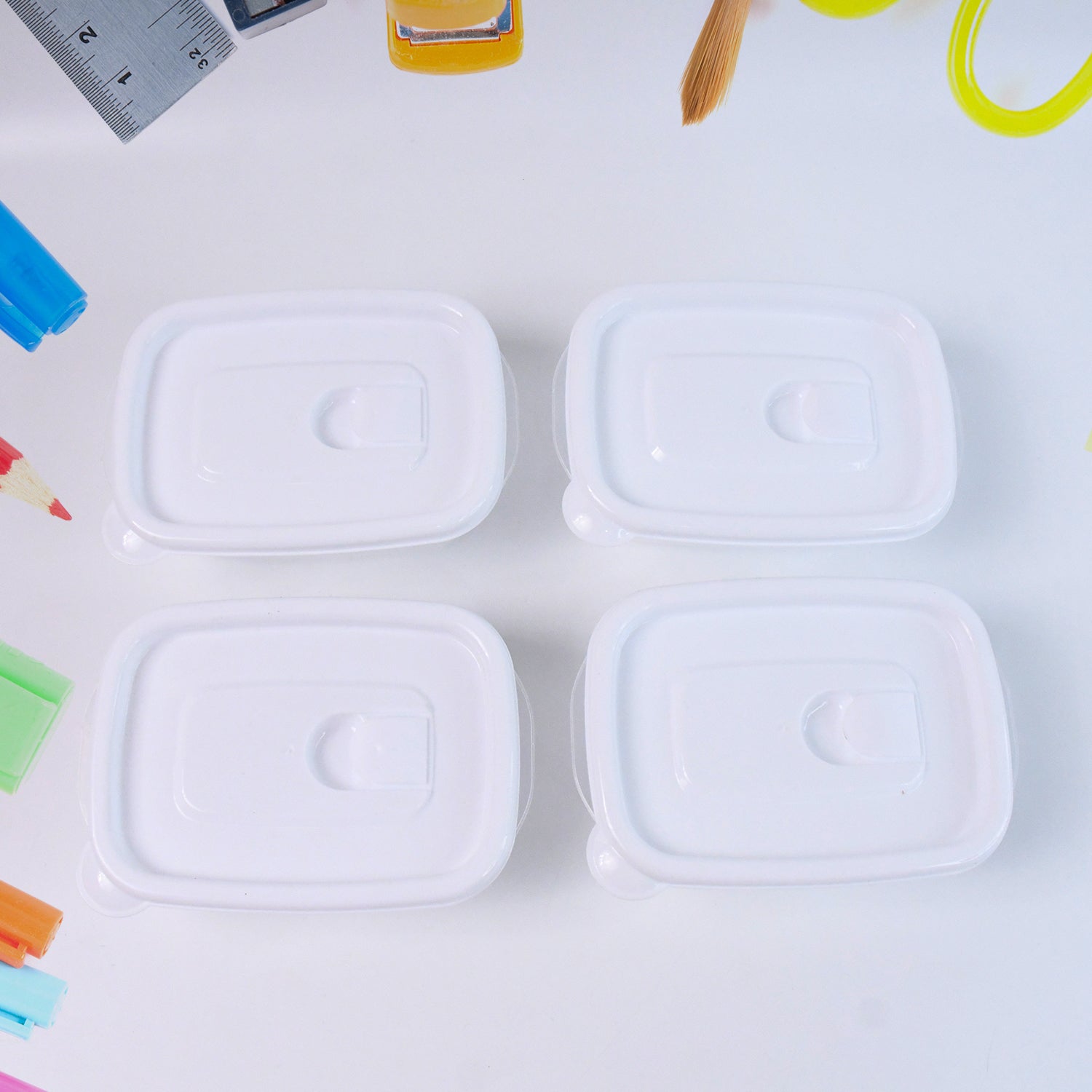 Set of four Wukusy microwave-safe food storage containers in 400ml size for home and kitchen use.