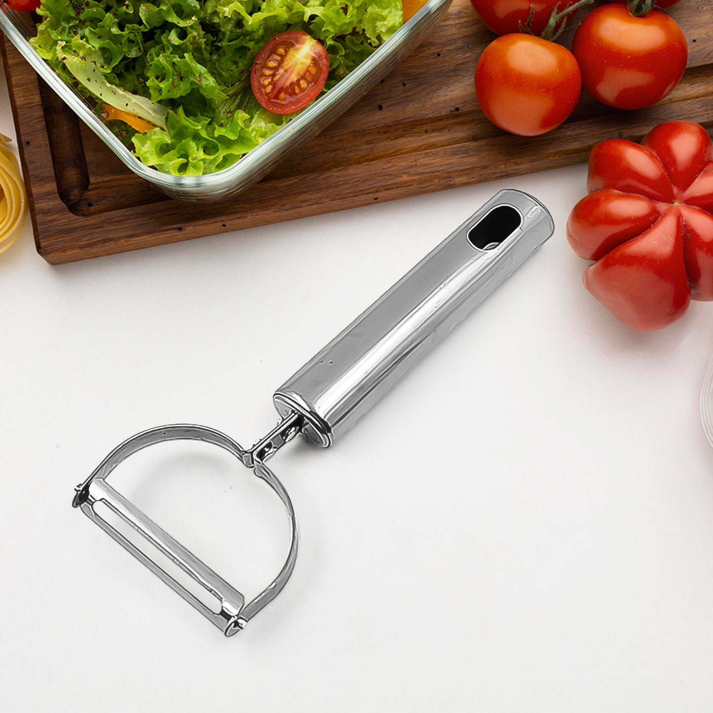 Wukusy fruit and vegetable peeler tool for quick peel removal, shown on a clean kitchen surface.