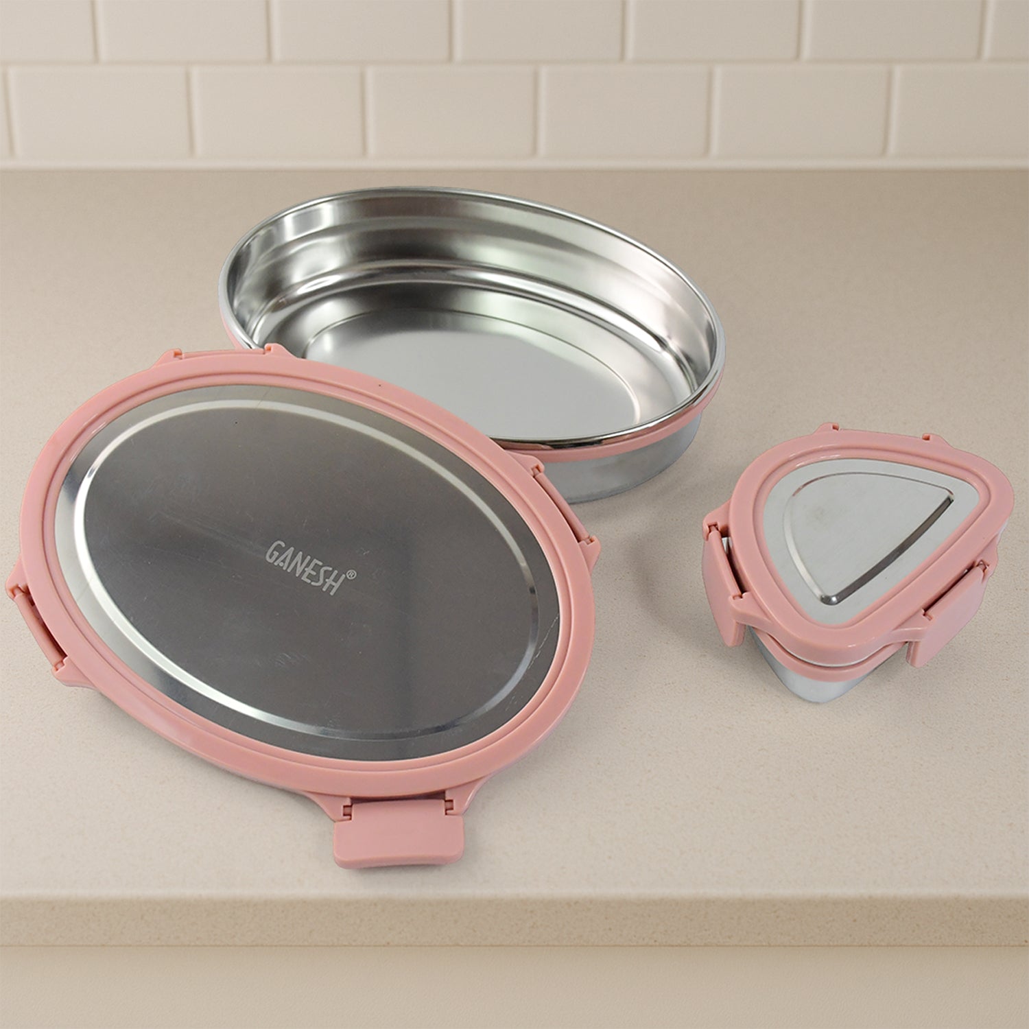 Wukusy Ganesh Classy 2-piece stainless steel lunch box set with leak-proof lids, ideal for home and kitchen use.