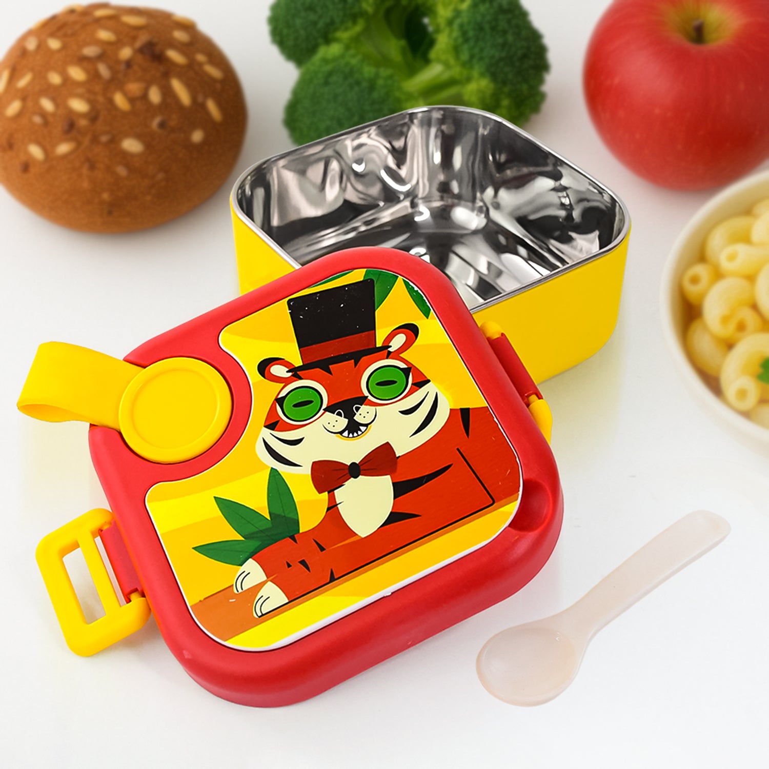 Wukusy Ganesh Tangy Kids stainless steel lunch box with colorful design, durable and suitable for children's packed meals.