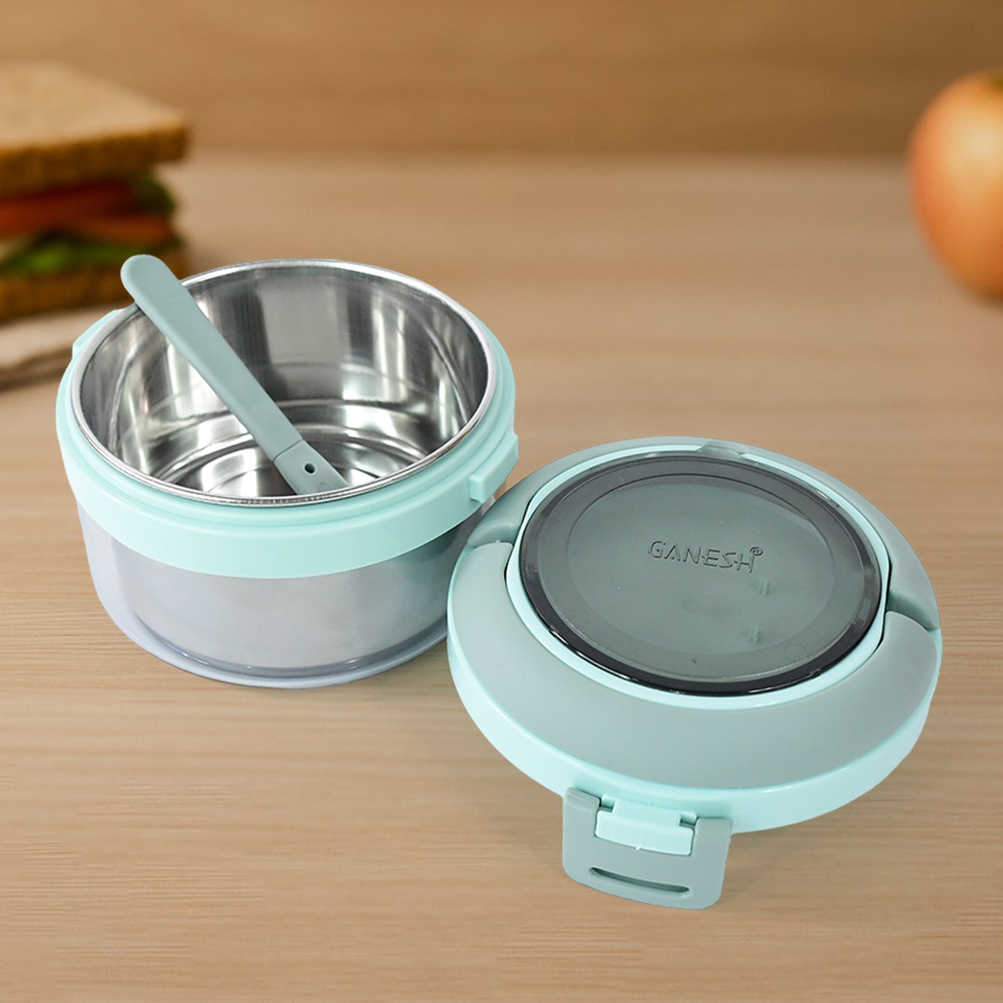 Wukusy Ganesh Tiara 400ml stainless steel insulated lunch box with leakproof lid and folding spoon, ideal for home and kitchen use.