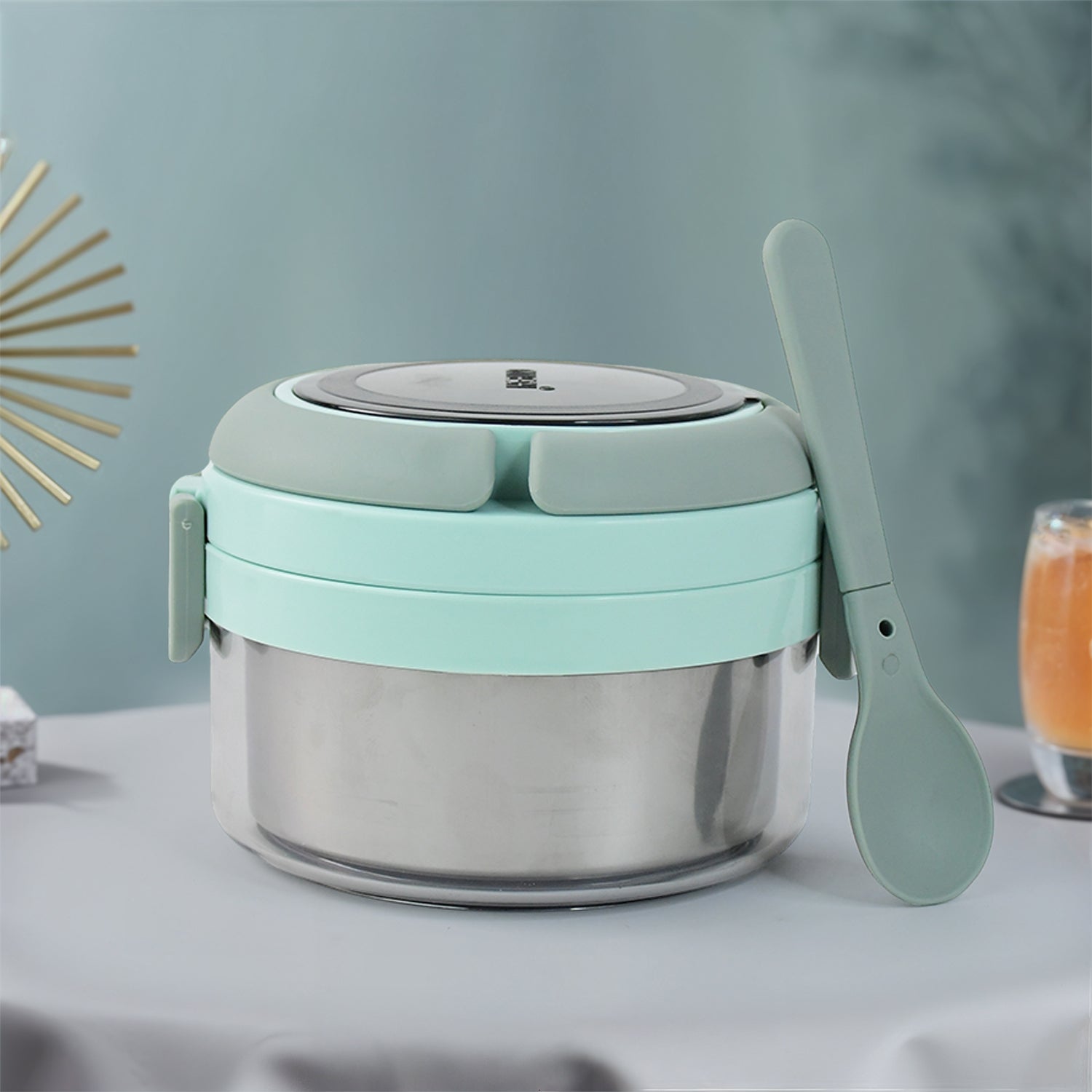 Wukusy Ganesh Tiara 400ml stainless steel insulated lunch box with leakproof lid and folding spoon for home and kitchen use.
