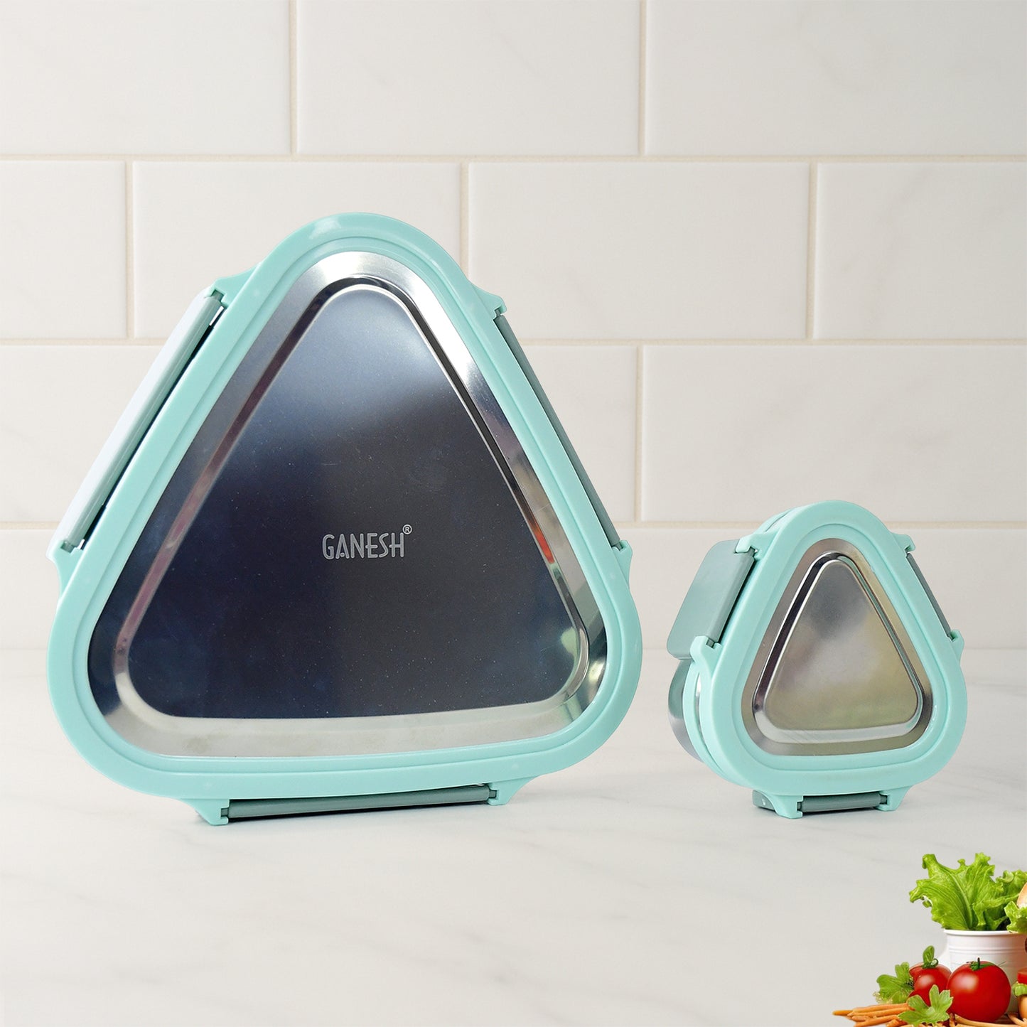 Wukusy Ganesh Trinity 2-piece stainless steel triangle lunch box set for home and kitchen storage.