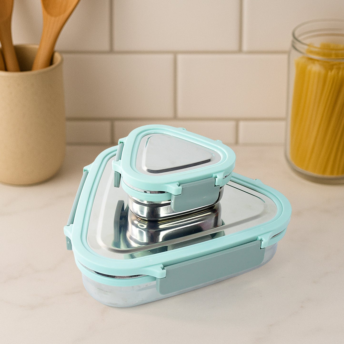 Wukusy Ganesh Trinity 2-piece stainless steel triangle lunch box set for home and kitchen storage.